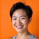 Professional headshot of Maya Chen, a certified fitness professional.