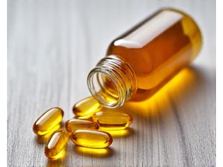Fish oil capsules in a clear bottle